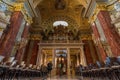 Budapest, Hungary - Feb 8, 2020: Organ pipe facade with golden fresco ceiling in St. Stephen`s Basilica