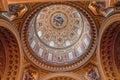 Budapest, Hungary - Feb 8, 2020: Upward view of gilded golden dome cupola inside St. Stephen`s Basilica Royalty Free Stock Photo
