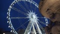 Budapest, Hungary. The Ferris wheel illuminated in white in the evening