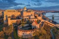 Budapest, Hungary - Golden sunrise at Buda Castle Royal Palace with Szechenyi Chain Bridge Royalty Free Stock Photo