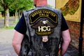 Budapest. Harley Davidson motorcycle convention. male bike riders upper body with leather vest and HOG symbols