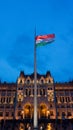 Budapest Hungary Hungarian flag in front of parliament at night