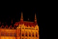 Budapest Hungary, 05.29.2019 Hungarian Parliament Building. night Budapest, glowing in gold. facade and roof of an old building Royalty Free Stock Photo