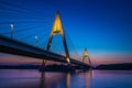 Budapest, Hungary - The illuminated Megyeri Bridge over river Danube at blue hour Royalty Free Stock Photo