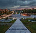 Budapest, Hungary - Illuminated rooftop garden of the Museum of Ethnography at City Park with dark clouds and colorful sunset sky