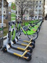 Budapest, Hungary - January 21th, 2022: Rentable micro mobility vehicles: Bird scooters, MOL Bubi bicycles on a mobility point