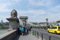 Budapest / Hungary - July 28 2019: The Szechenyi Chain Bridge crossing the Danube River in Budapest. Group of tourist people