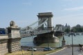 Budapest / Hungary - July 28 2019: The Szechenyi Chain Bridge crossing the Danube River in Budapest. Group of tourist people