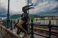 BUDAPEST, HUNGARY: The little princess Jester statue is perched by the tram rails on the Pest, Buda Castle by Danube riverbank in