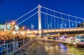 BUDAPEST, HUNGARY - MARCH 30, 2019: Tourist wait for ferry boat at night for Danube cruise tour