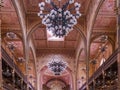 BUDAPEST, HUNGARY- MAY, 26, 2019: ceiling and chandelier inside the nave of the great synagogue in budapest Royalty Free Stock Photo