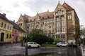 National Archives of Hungary building on a rainy day. The building is located in Varnegyed Castle Quarter and is an example of