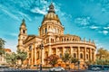 BUDAPEST, HUNGARY-MAY 04, 2016: St.Stephen Basilica in Budapest at daytime. Side View from street with car`s and people. Hungary Royalty Free Stock Photo