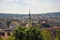 View on Budapest from Gellert Hill, Hungary. Ancient houses with tiled roofs, majestic palaces and basilicas against a cloudy