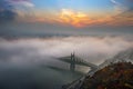 Budapest, Hungary - Mysterious foggy sunrise with Liberty Bridge Szabadsag hid and hazy skyline of Budapest Royalty Free Stock Photo