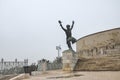 Budapest, Hungary - Nov 6, 2019: Side statue of the Liberty Statue on the Gellert hill. Torchbearer sculpture. Tourist landmarks