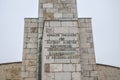 Budapest, Hungary - Nov 6, 2019: Sign in the Hungarian language on the pedestal of the Liberty Statue. Statue on the Gellert Hill Royalty Free Stock Photo