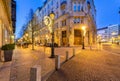 Budapest, Hungary - November 30, 2019: Twilight street view on Dorottya utca with people walking on the street