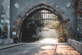 Morning sun shining through trees with warm glow and gate of Vajdahunyad castle in Budapest city park Royalty Free Stock Photo