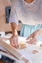 Budapest, Hungary - October 19, 2109: Traditional home-made gingerbread baking. Cuting the dough with cookie cutter shapes