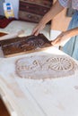 Budapest, Hungary - October 19, 2109: Traditional home-made gingerbread baking. Gingerbread with wooden press technique