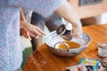 Budapest, Hungary - October 19, 2109: Traditional home-made gingerbread baking. Staring Ingredients in a bowl get mixed