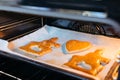 Budapest, Hungary - October 19, 2109: Traditional home-made gingerbread baking. Egg brushed gingerbreads baking in the oven