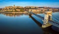 Budapest, Hungary - Panoramic aerial view of Szechenyi Chain Bridge at sunrise with Buda Castle Royal Palace Royalty Free Stock Photo