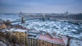 Budapest, Hungary - Panoramic skyline view of the Szechenyi Chain Bridge on the icy River Danube with Parliament and Bazilika