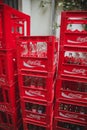 Red boxes with empty glass Coca Cola bottles