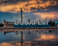 Budapest, Hungary - Reflecting Budapest sign with unique mammatus clouds mammatocumulus over Heroes` Square Royalty Free Stock Photo