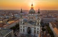Budapest, Hungary - The rising sun shining through the tower of the beautiful St.Stephen`s Basilica Royalty Free Stock Photo