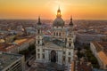 Budapest, Hungary - The rising sun shining through the tower of the beautiful St.Stephen`s Basilica Royalty Free Stock Photo