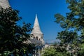 Budapest, Hungary - 15 September 2019 - Arcades and dome of the Fishermen`s Bastion with Budapest Parliament at the back of the f