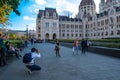 Budapest. Hungary, September 2019 - people taking photos near the dome of Hungarian Parliament building Royalty Free Stock Photo