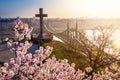 Budapest, Hungary - Spring has arrived in Budapest with beautiful Cherry Blossom, cross and Liberty Bridge Royalty Free Stock Photo