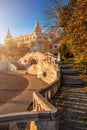 Budapest, Hungary - Sunrise at the entrance of Fisherman`s Bastion Halaszbastya with autumn foliage Royalty Free Stock Photo