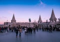 People visiting Fisherman`s Bastion at Budapest at sunset Royalty Free Stock Photo