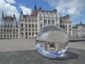 The entrance of Parliament building in Budapest, Hungary through crystalball