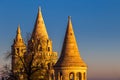 Budapest, Hungary - Towers of the famous Fisherman`s Bastion Halaszbastya on a golden sunny autumn morning Royalty Free Stock Photo