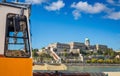 Budapest, Hungary - Traditional yellow hungarian tram at the riverside of Danube with Buda Castle Royal Palace Royalty Free Stock Photo