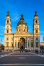 Budapest, Hungary - Warm colors on St. Stephens Basilica Szent Istvan Bazilika at sunset with clear blue sky