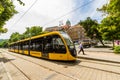 Editorial, Modern Budapest Tram with dome of Buda Castle in the background