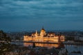 Budapest parliament night yellow illumination river bank Royalty Free Stock Photo