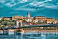 Budapest Royal Castle and Szechenyi Chain Bridge at day time from Danube river, Hungary Royalty Free Stock Photo