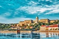 Budapest Royal Castle and Szechenyi Chain Bridge at day time from Danube river, Hungary Royalty Free Stock Photo