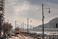 Budapest tram, or called Villamos, Ganz CSMG, passing in frong of Erzebet Hid Bridge by the danube.