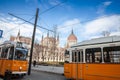 Budapest tram, or called Villamos, Ganz CSMG, on a stop in front of budapest parliament.