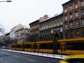 Budapest on a winter day with blurry yellow tram passing by