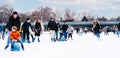 04.01.2022.Budapest.Happy little boy and girl learning to skate in winter.Hobbies and Leisure.Winter sports.Family winter sport.